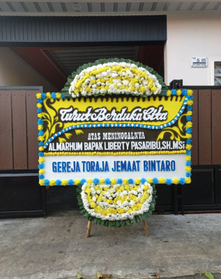 Papan Bunga Duka di Tului